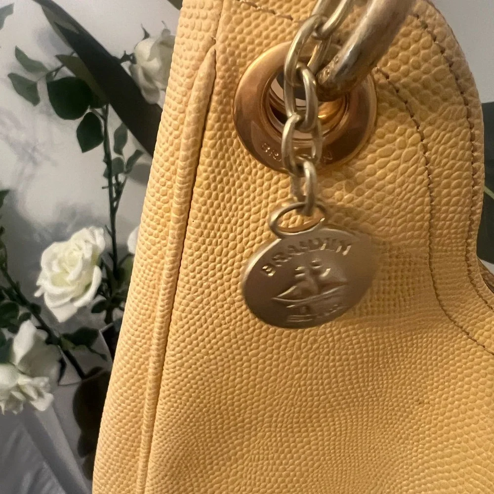 Brahmin yellow/white hobo style shoulder bag. Gold hardware.Rare light yellow